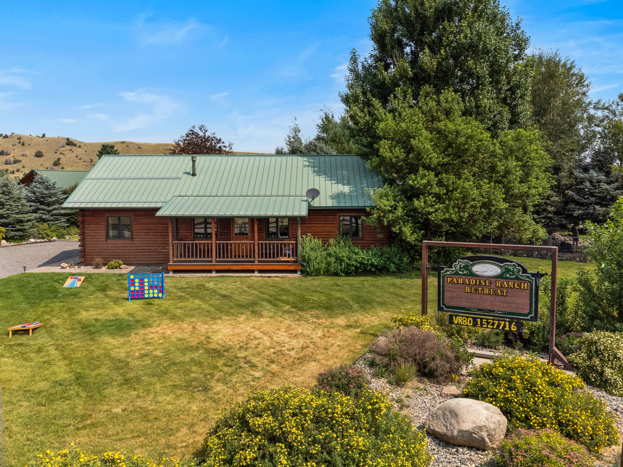 green grass, remove vrbo referenced from sign