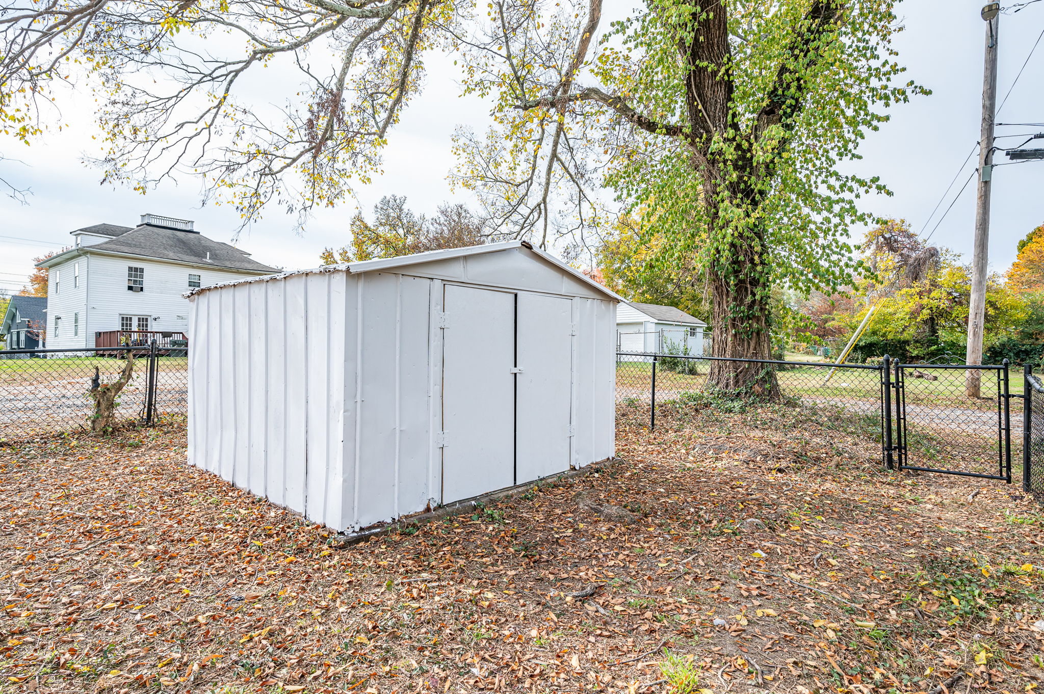 Outdoor shed with plenty of room for lawn equipment and additional storage