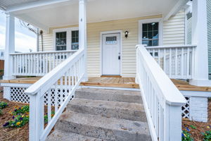 Full front porch with brand new decking