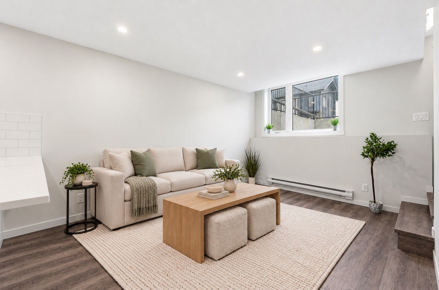 Virtually staged and rendered in #113 finishes. South-facing living room. Furniture not included.