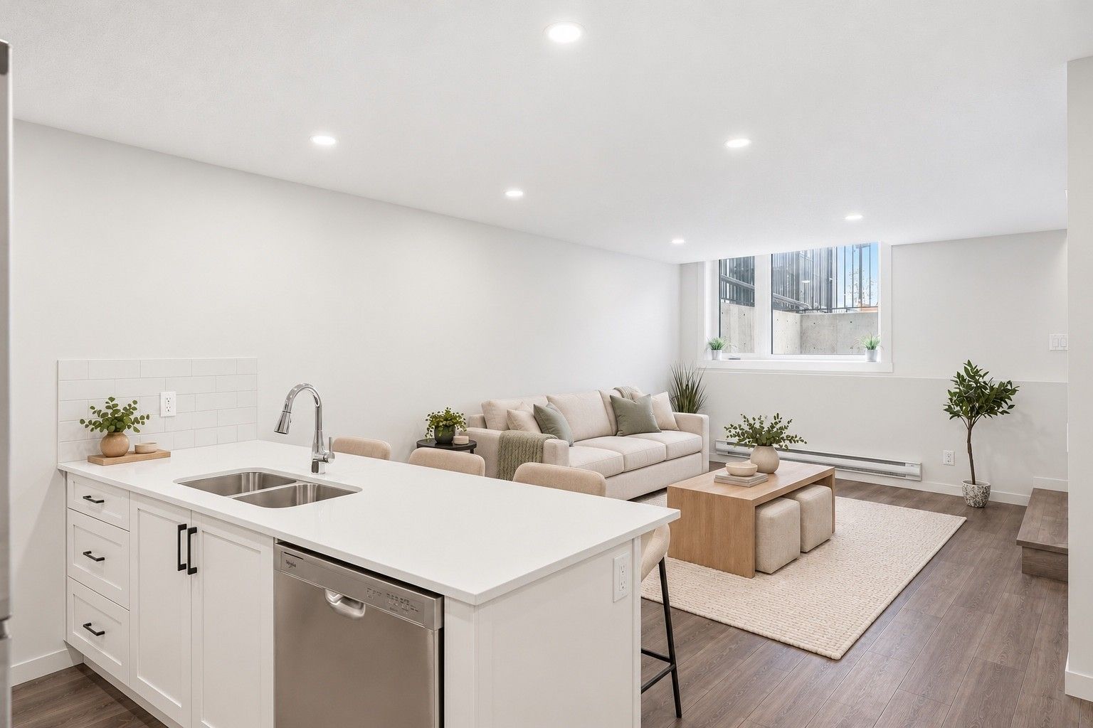 Virtually staged and rendered in #113 finishes. White quartz kitchen peninsula open to the living room. Furniture not included.