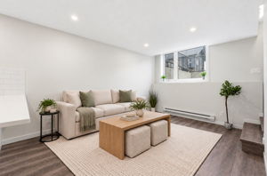 Virtually staged and rendered in #113 finishes. South-facing living room. Furniture not included.