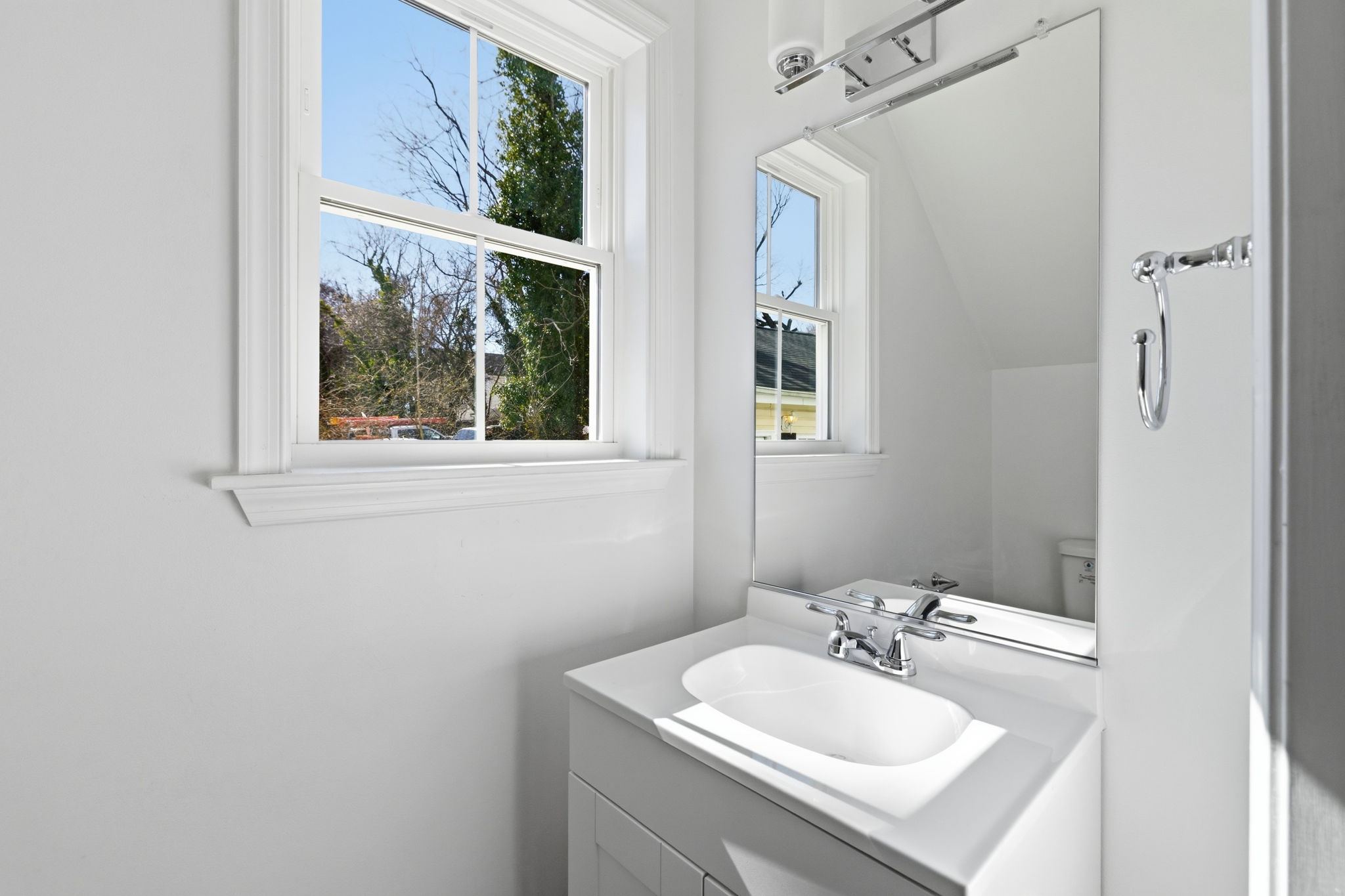 First floor 1/2 bath located just off of the living and kitchen areas.