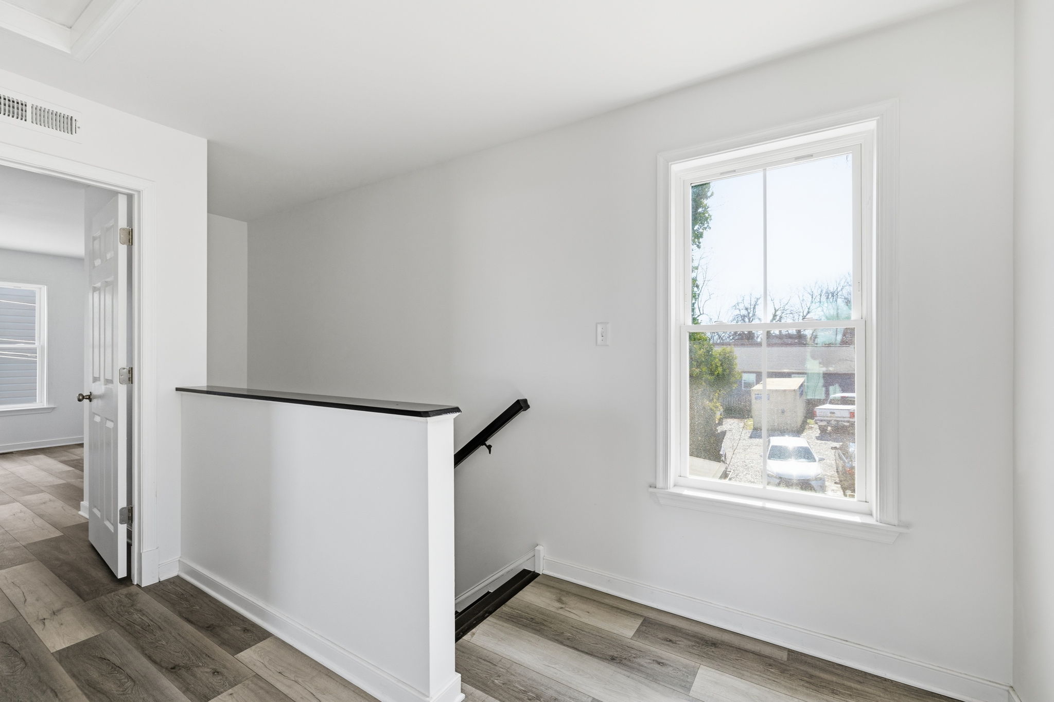 Spacious 2nd floor landing with LVP flooring.