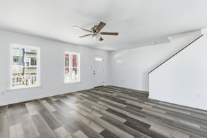 Front stair case to 2nd floor in living room.