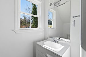 First floor 1/2 bath located just off of the living and kitchen areas.