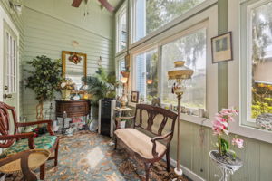 Sun Room with views of backyard