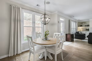 Positioned next to the kitchen and family room, this dining space is perfect for casual meals or morning coffee with a view of the backyard.