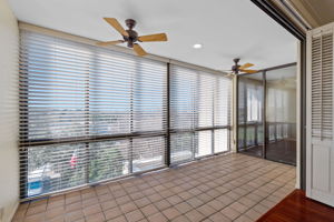 This unit features a delightful sun porch allowing for a third living space to enjoy stunning views and abundant light