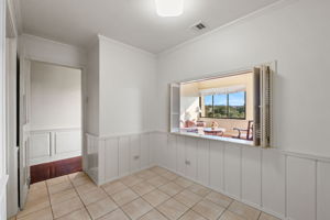 The delightful breakfast nook with pass-through to the living room
