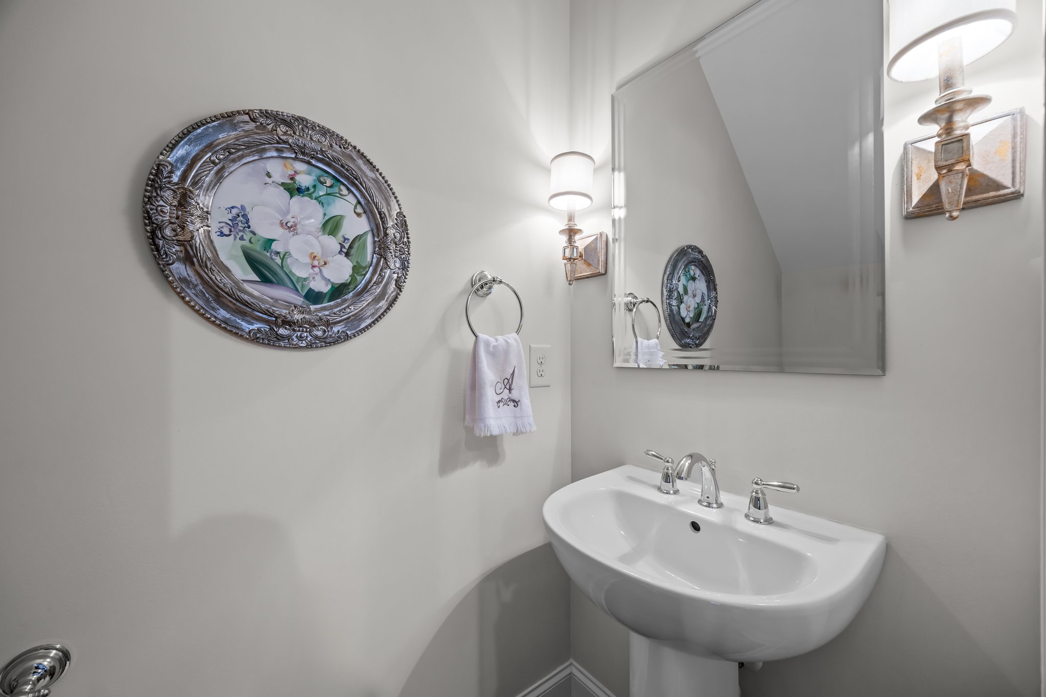 Half bath with sconce style lighting