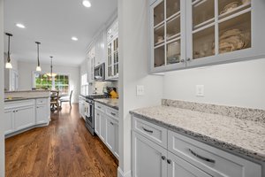 Butler's Pantry with lighted upper cabinets