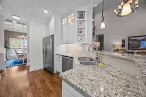 Open kitchen layout with bar height seating