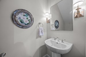 Half bath with sconce style lighting