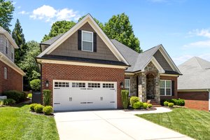Full Brick Exterior with Stone and Vinyl Shake Accents