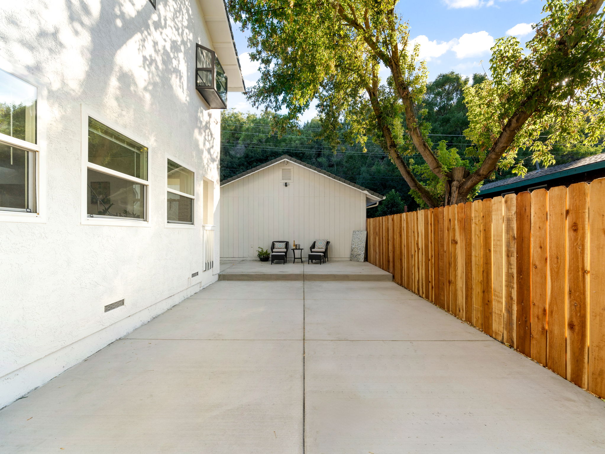 Left side of home has large PATIO area