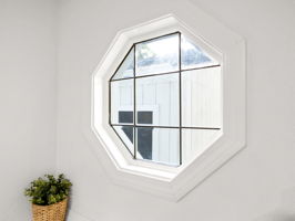 1 of 2 Hexagon Window Detail in Dining Room