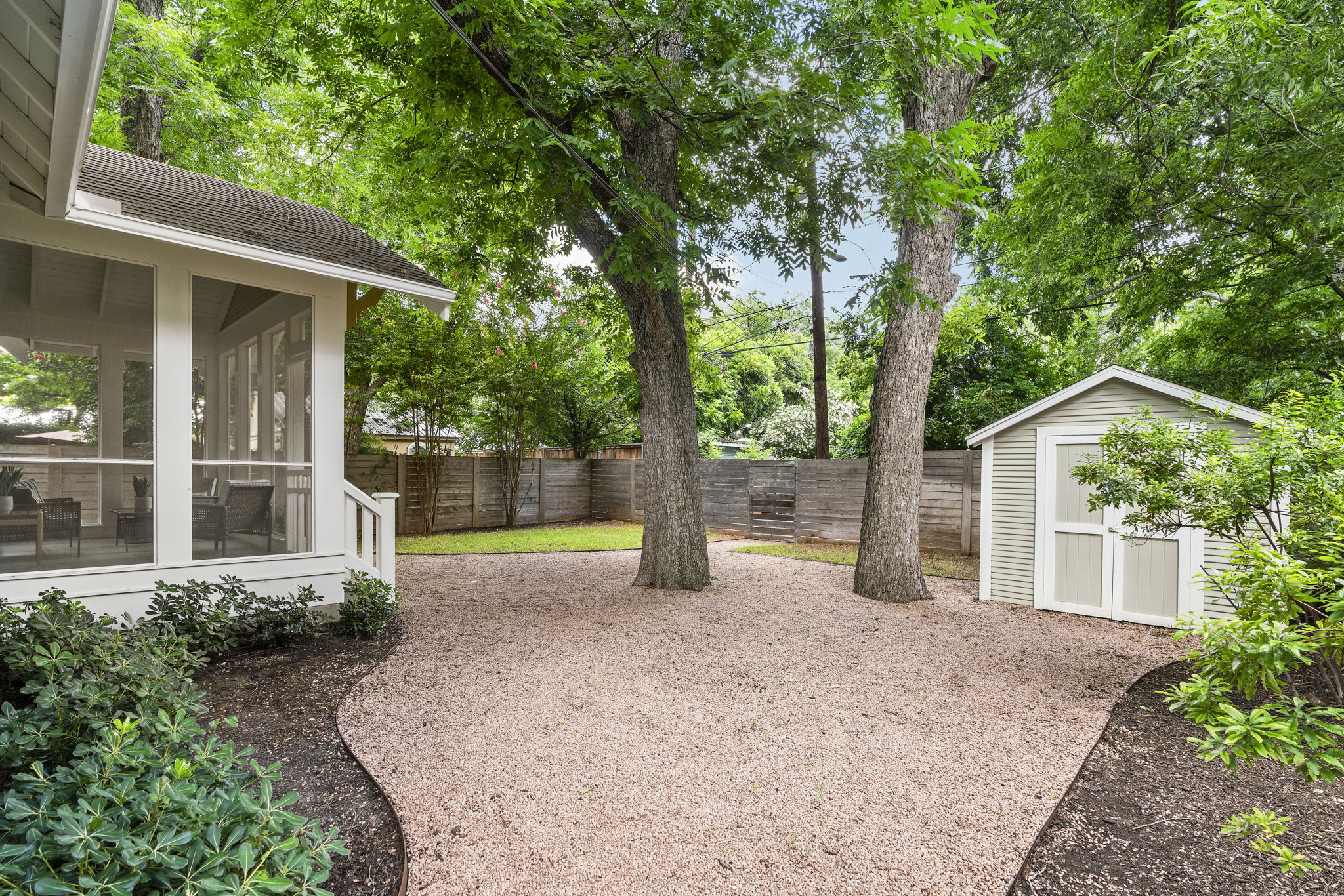 The backyard is perfect for both furry friends and gatherings with friends, offering a spacious and inviting outdoor space to enjoy together.