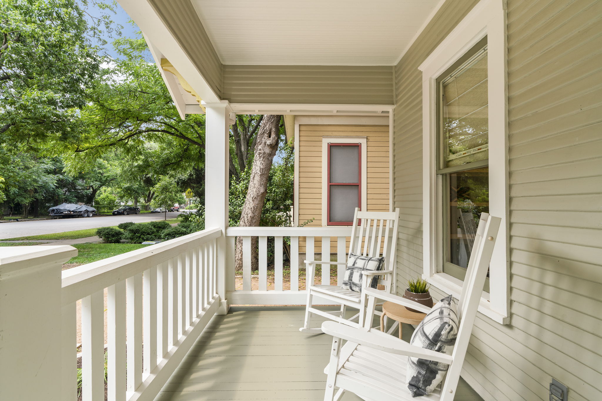 Relax and unwind on the beautiful front porch, complete with ample space for your rocking chairs and a pitcher of refreshing iced tea. This inviting area perfectly captures the charm and tranquility of living in Hyde Park.