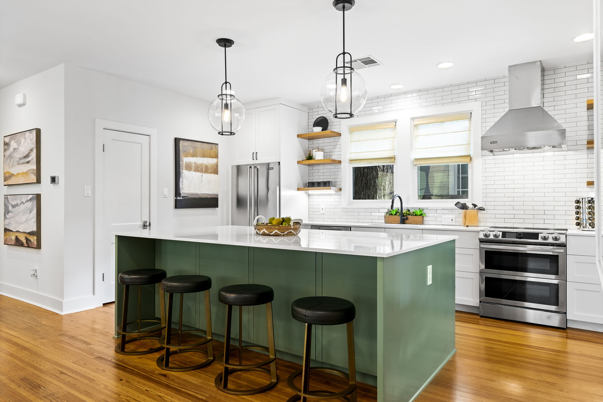 Experience the heart of the home in the kitchen. Premium custom cabinets offer ample storage with an exquisite touch. Sleek stainless steel appliances add modern elegance, making cooking and entertaining effortless.