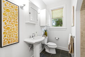 The conveniently located powder room offers a practical and easily accessible space for both residents and guests.