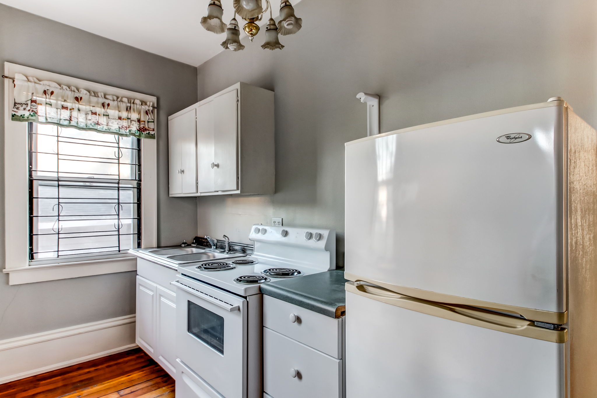 Fully equipped kitchen in the 2nd floor unit at 401 E Duffy St