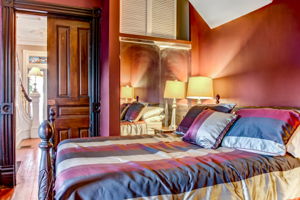 Main House Bedroom 2 with lovely original pocket doors