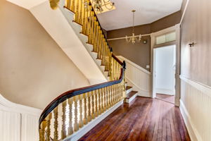 Beautiful staircase with hardwood flooring