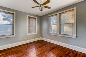 Spacious living room in 2nd floor unit at 401 E Duffy St with beautiful hardwood flooring
