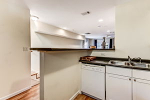 Fully equipped kitchen with beautiful wood flooring at 1208 Habersham St (Carriage House)