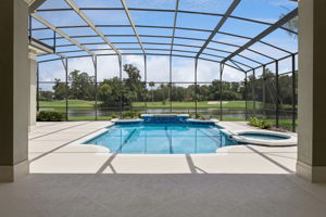 Pool and spa with beautiful water and golf view