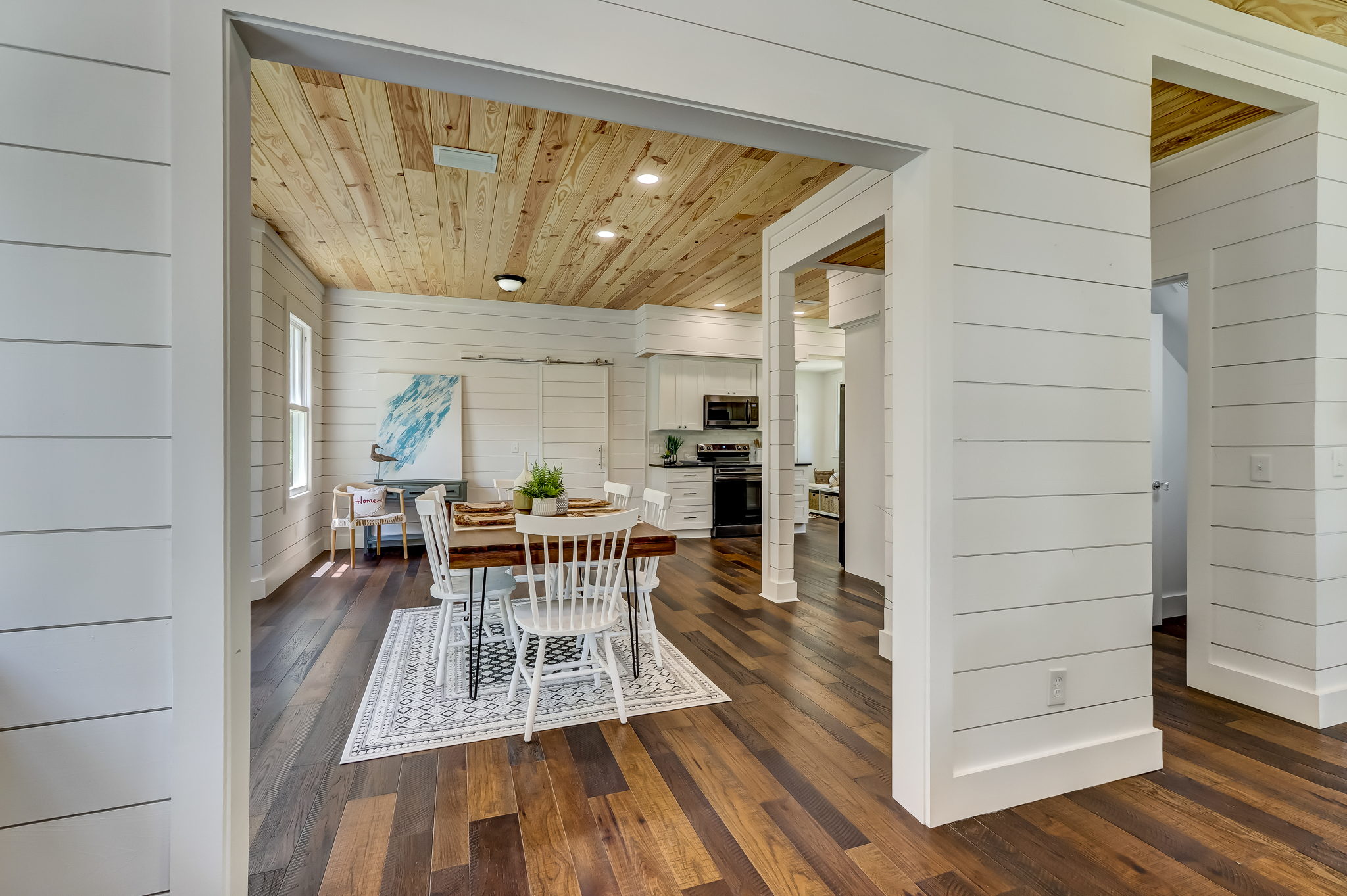 Great architectural features separate each room while maintaining an open floorplan