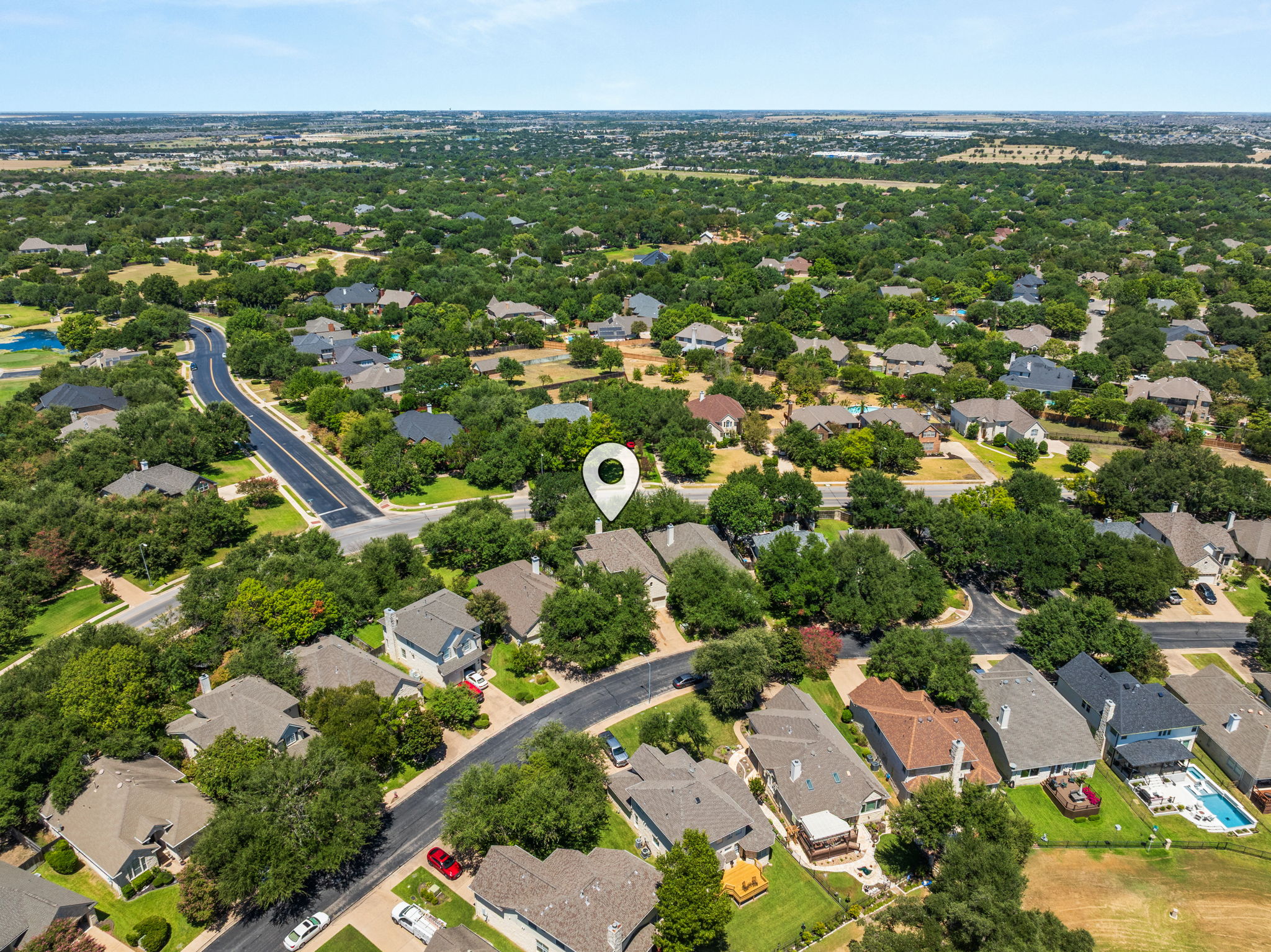 Just minutes from the entrance of the Forest Creek Golf Course.