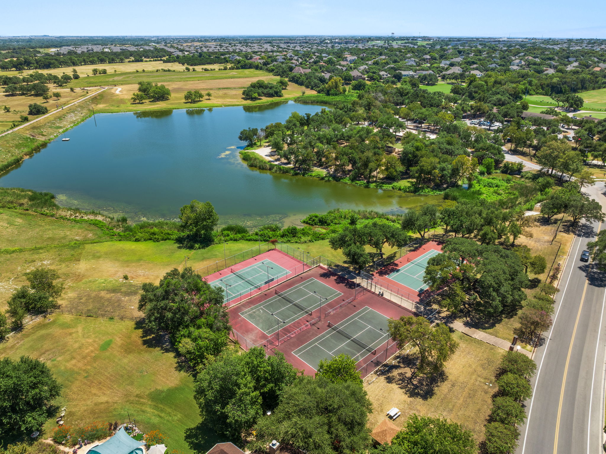 Forest Creek tennis courts that are just minutes away.