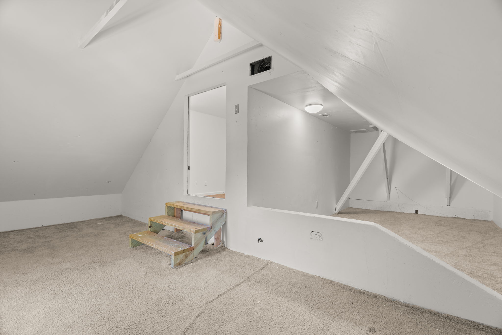 1 of 3 upper-level bedrooms. The nook in the bedroom to the right of the top of the stairs.