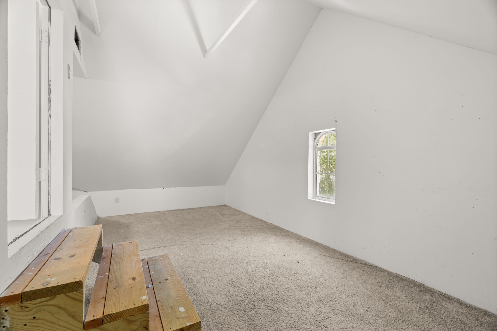 1 of 3 upper-level bedrooms. The nook in the bedroom to the right of the top of the stairs.