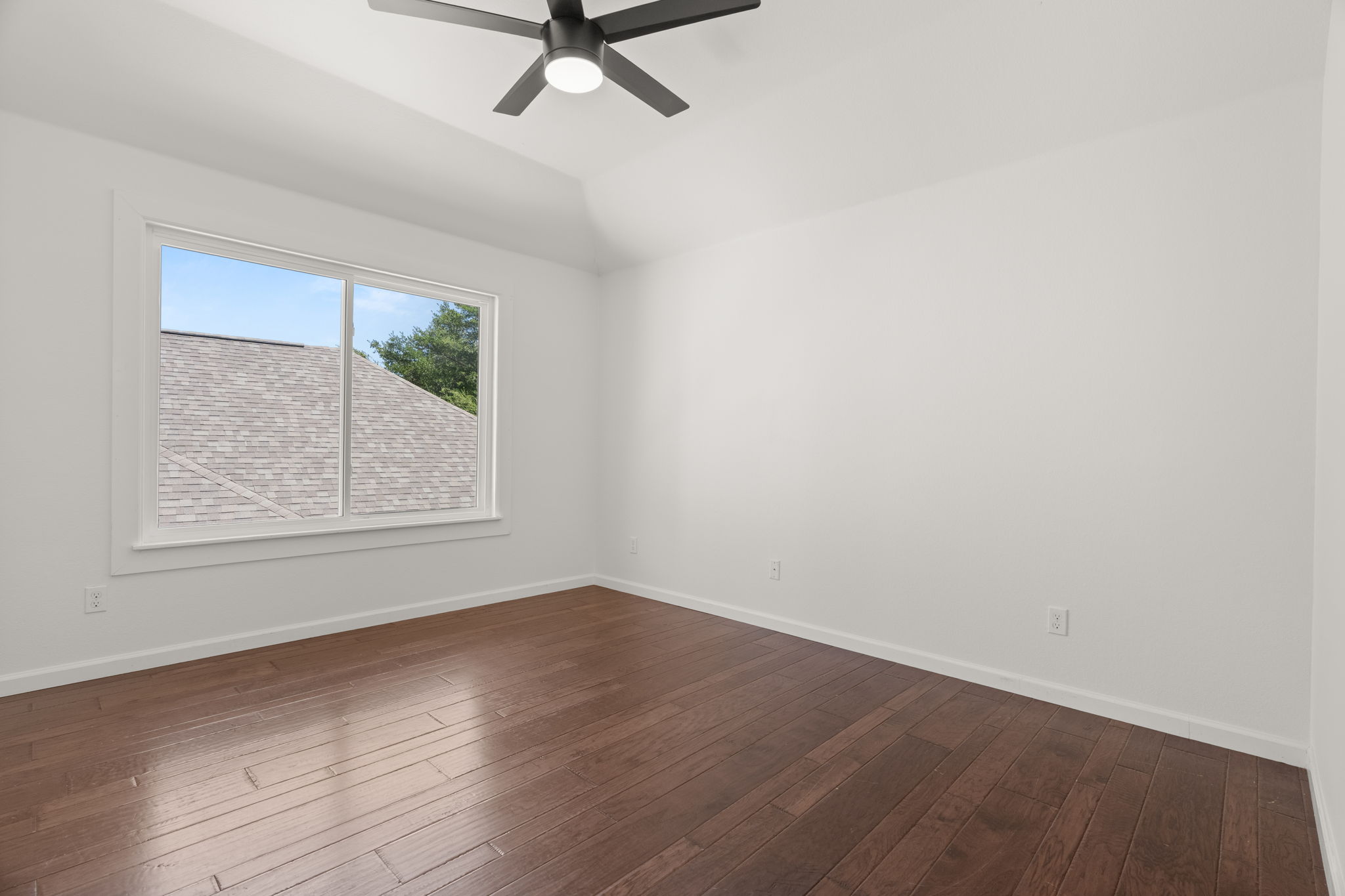 2 of 3 upper-level bedrooms.