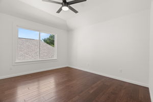 2 of 3 upper-level bedrooms.