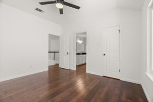 2 of 3 upper-level bedrooms.