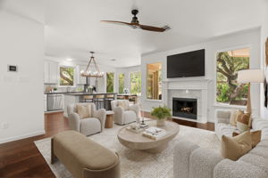 Virtually staged. The expansive lower level has soaring windows that flood the open floor plan with natural light.