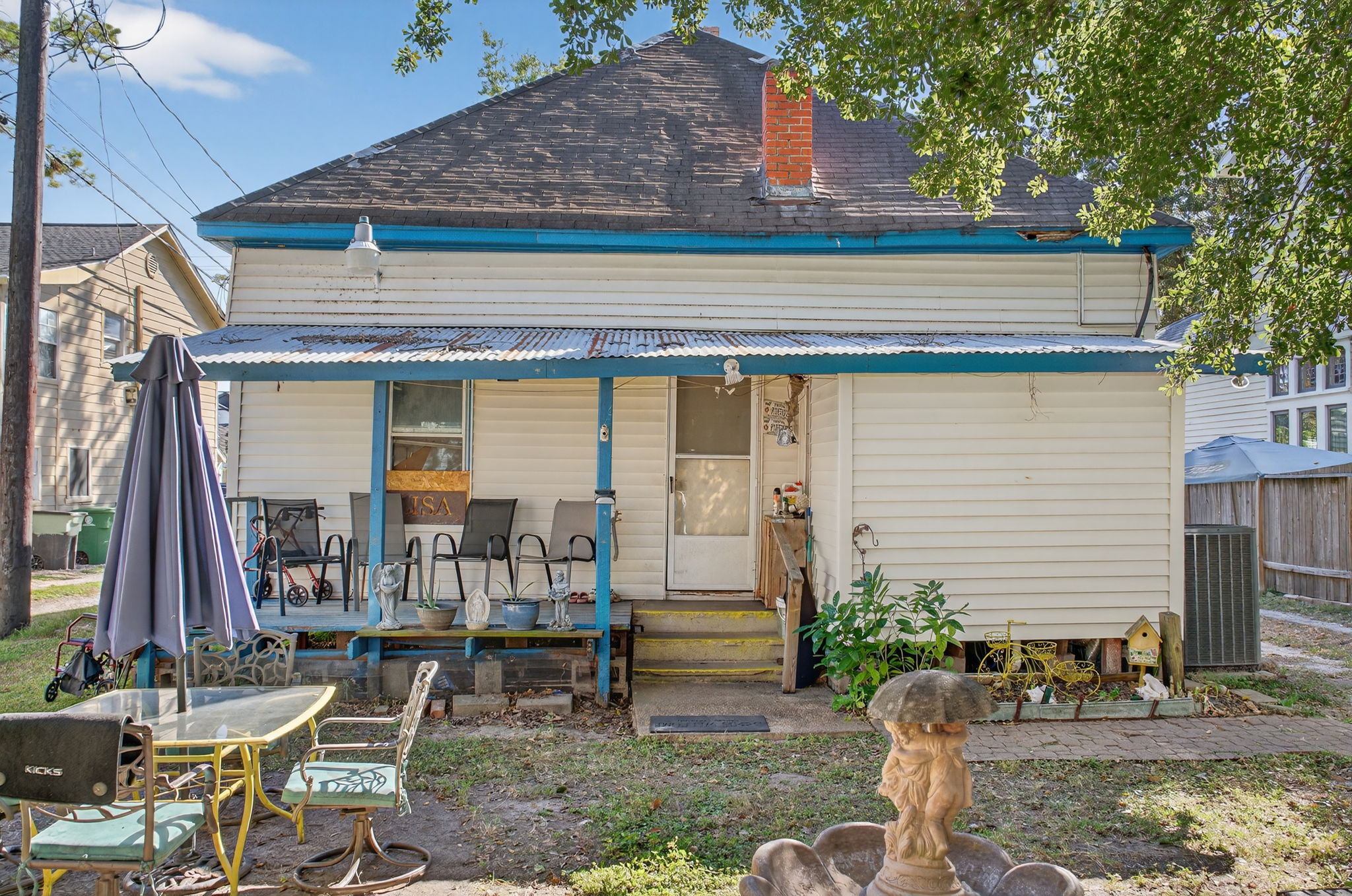 Backyard with covered patio.
