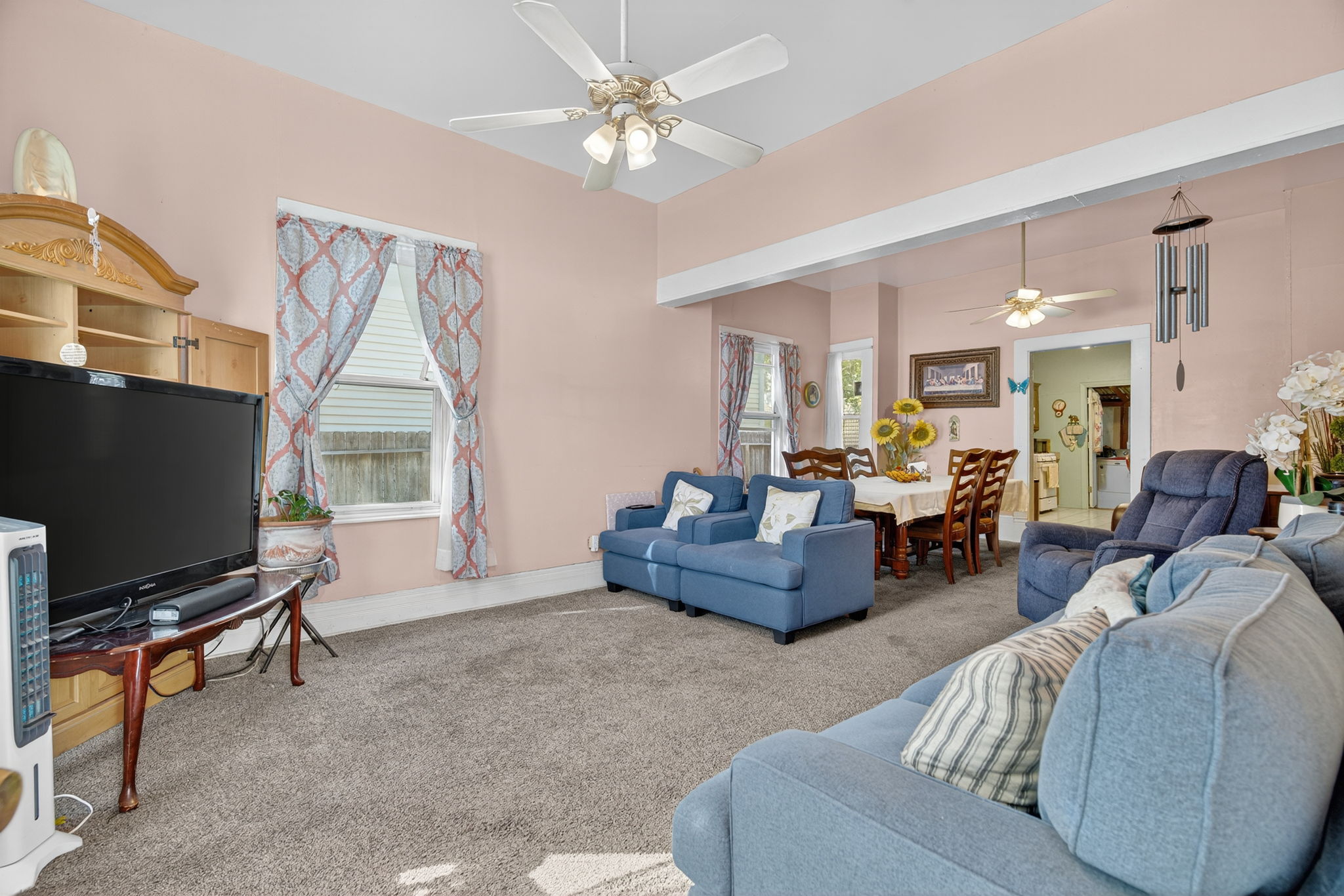 Coming home, you'll be greeted by a warm inviting living room.