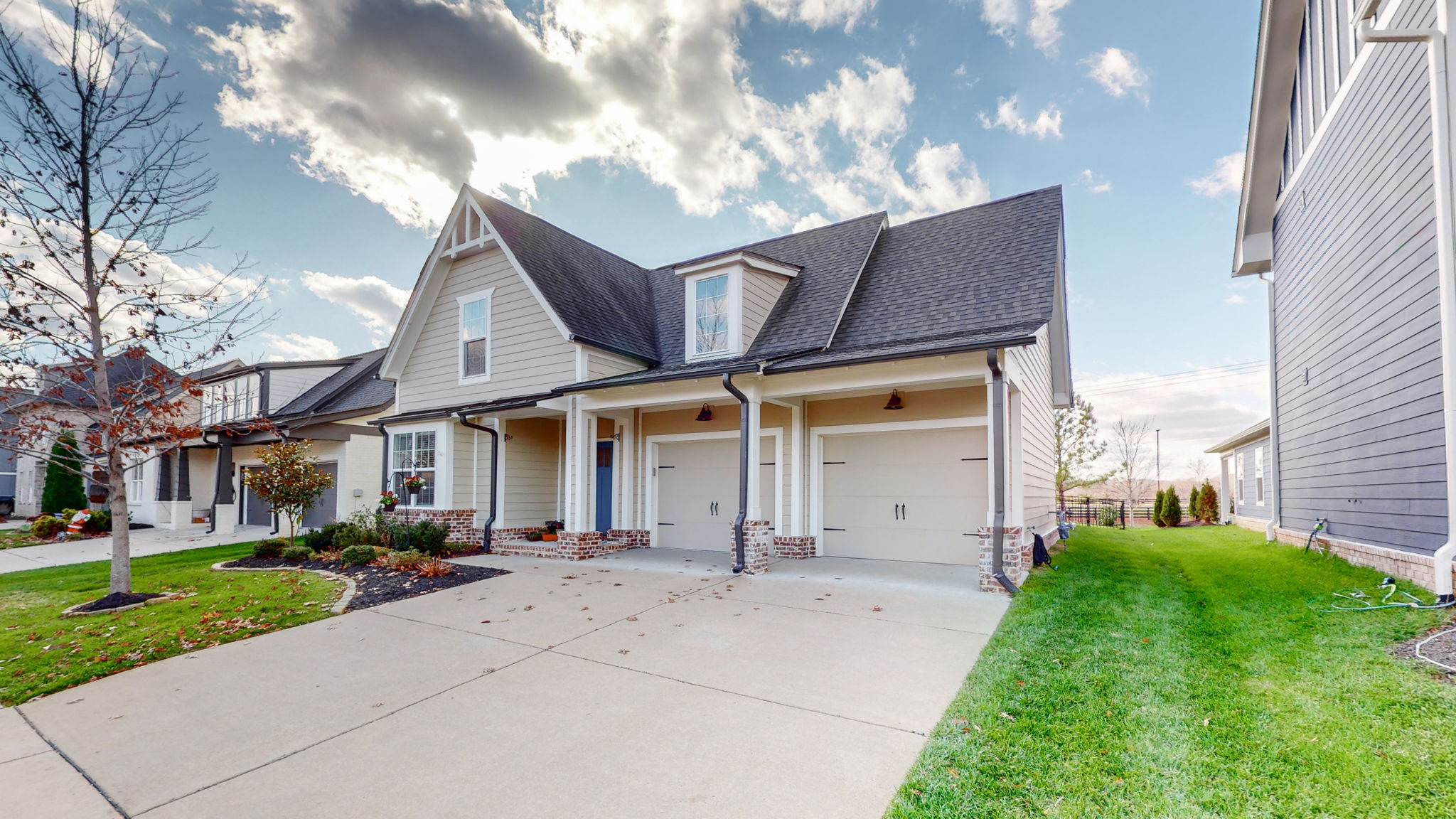 This east facing home features beautiful sunrises from the front porch and sunsets from the back patio.