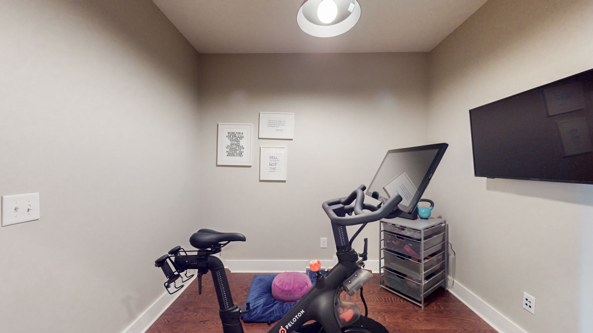 To the right of the hallway is a small bonus space, perfect for a playroom, office, or exercise room.