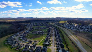 Popular Ladd Park features incredible amenities including 2 pools, 2 playgrounds, sports courts, hiking trails, a canoe launch into the Harpeth River, clubhouse, open fields for events, and tons of Social Events throughout the year.