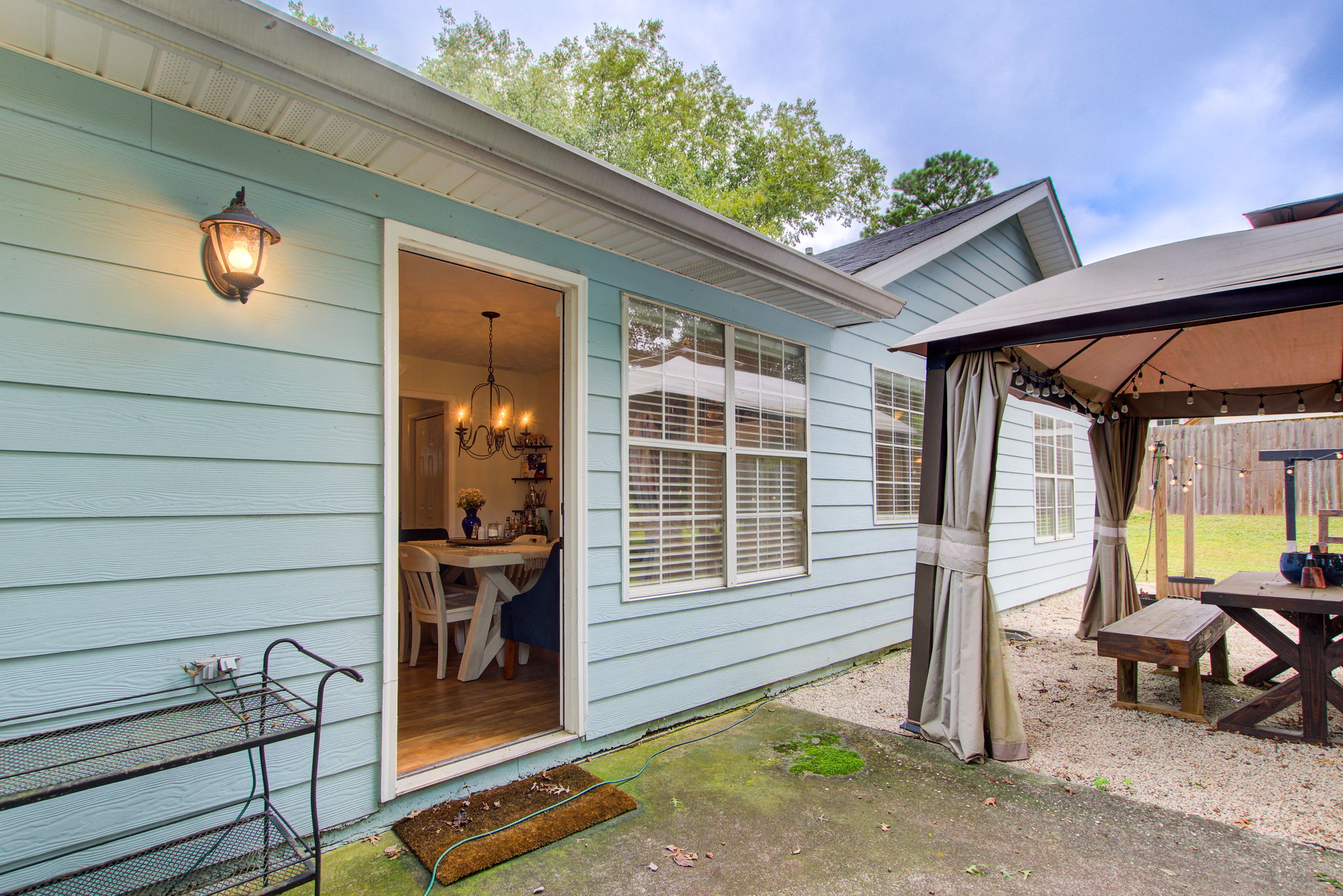 13 Ext Back Patio w Interior View