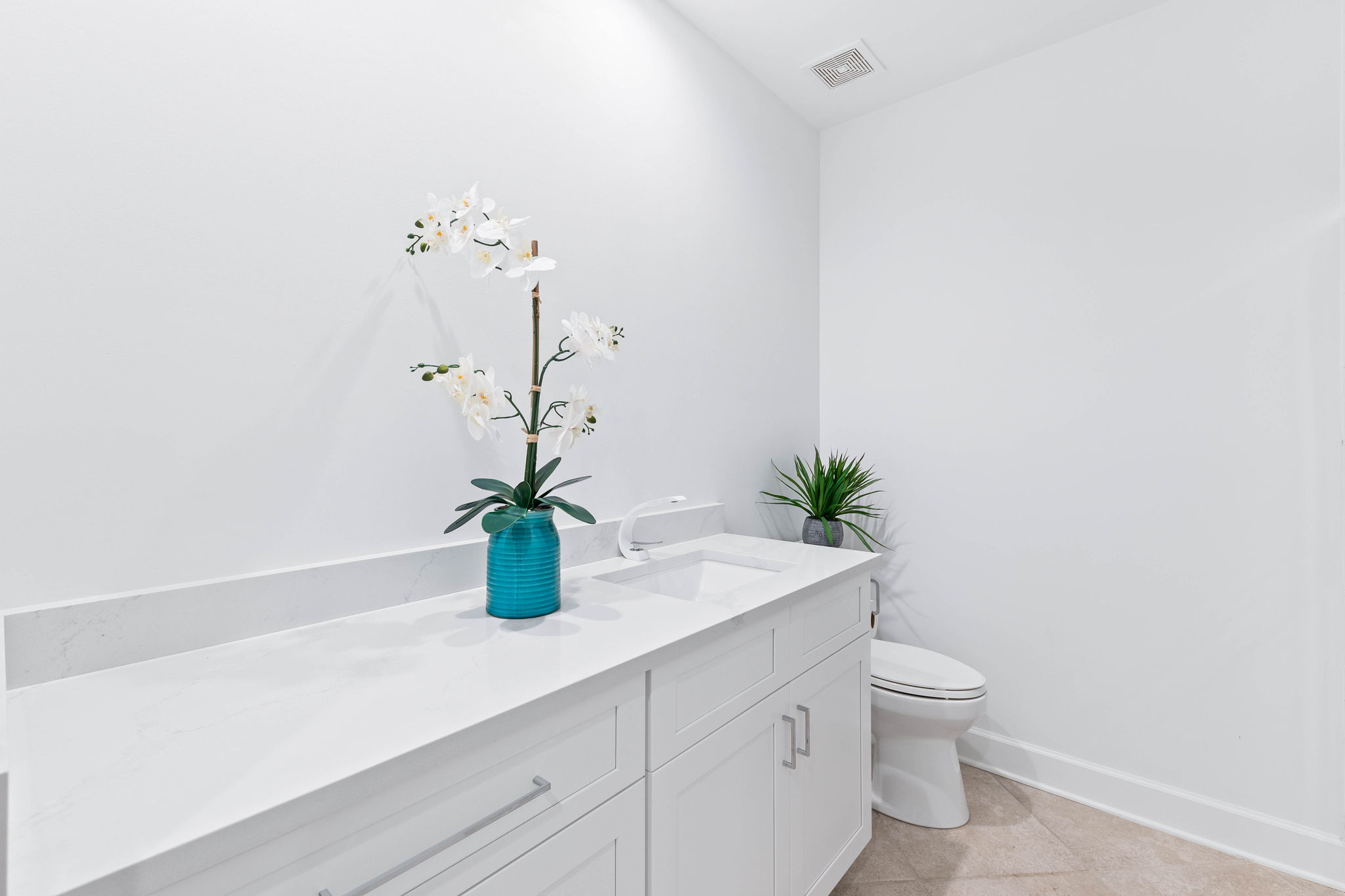 Virtual Staging include rectangle mirror above sink