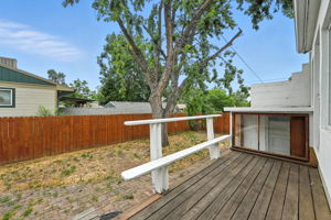 A deck off the kitchen for summer grilling~