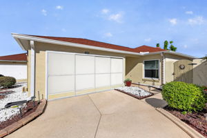 Front Elevation with Sliding Garage Door Screens