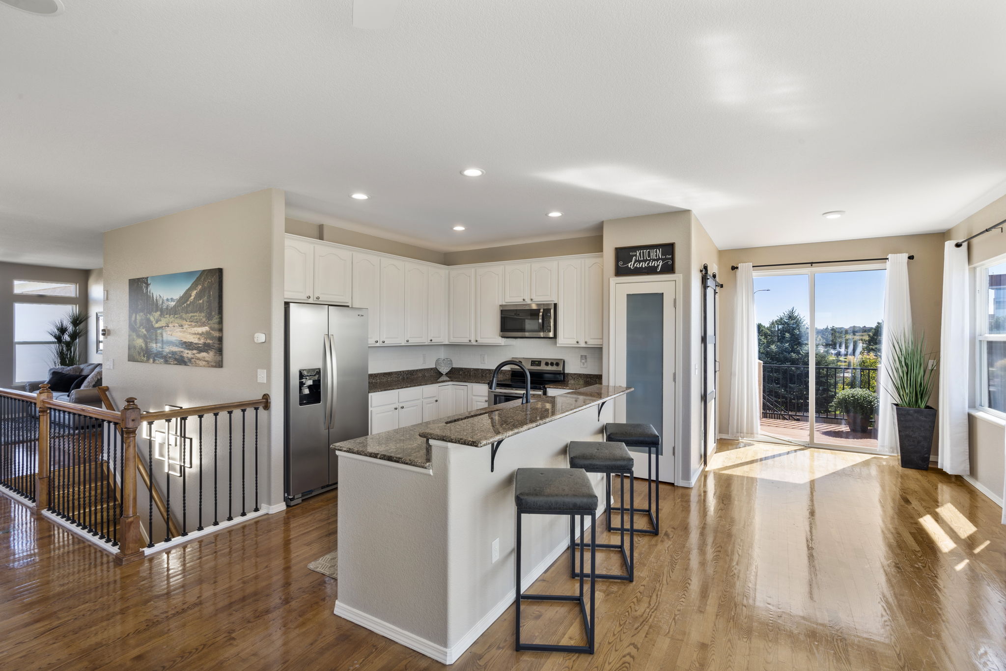 Breakfast Nook has walkout to Deck.